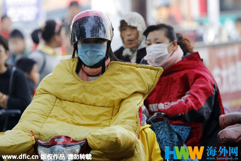 Vague de froid en Chine : des cyclistes super protégés