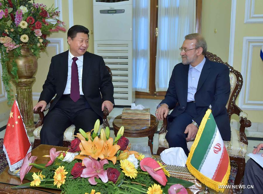 Le président chinois et le président du Parlement iranien discutent de la coopération