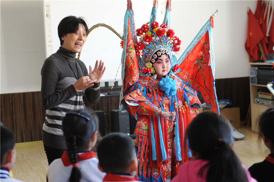 De jeunes Chinois passionnés par l'Opéra de Pékin