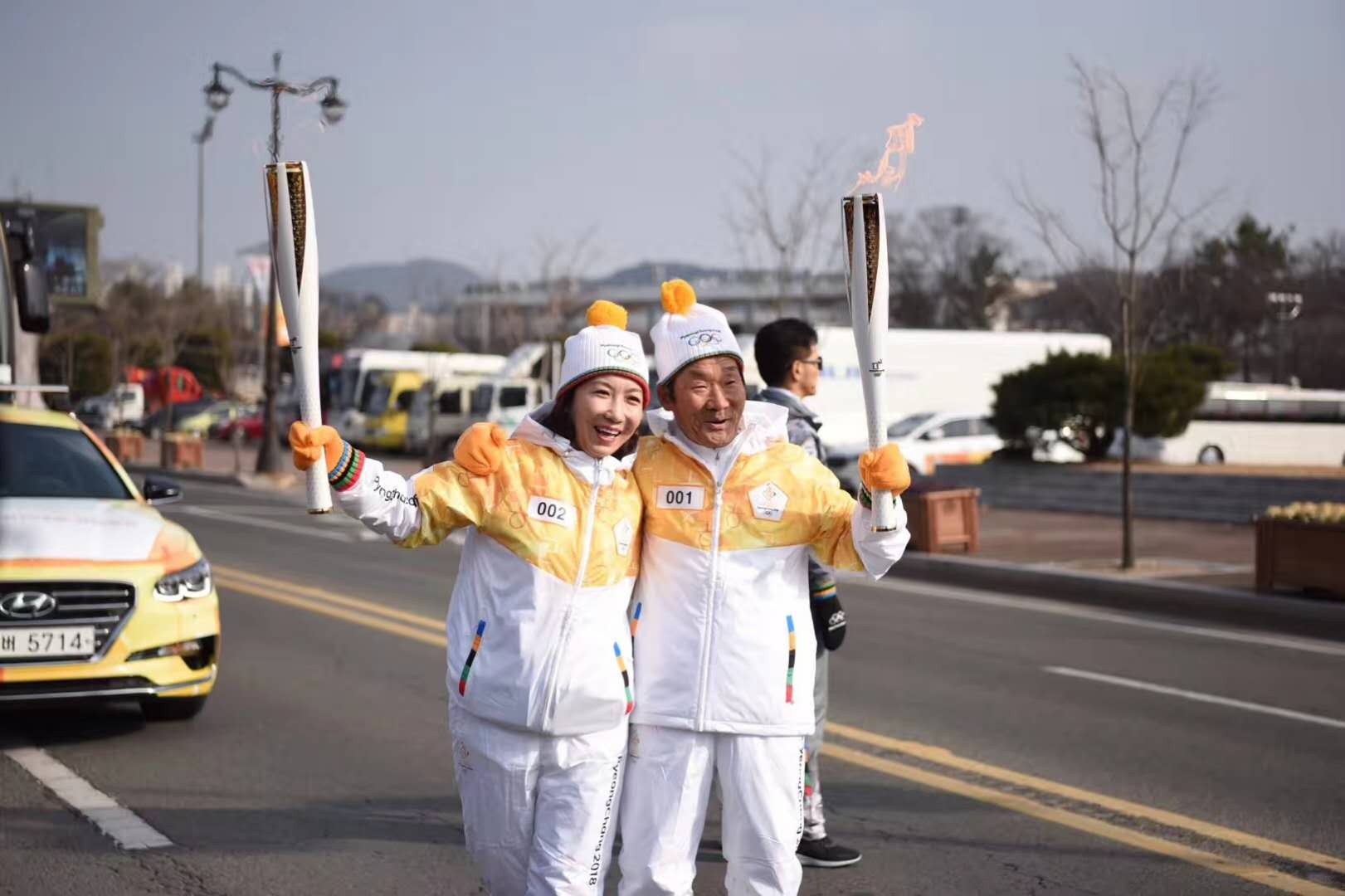 Le Quotidien du Peuple en ligne participe au relais de la flamme olympique des JO d'hiver de Pyeongchang