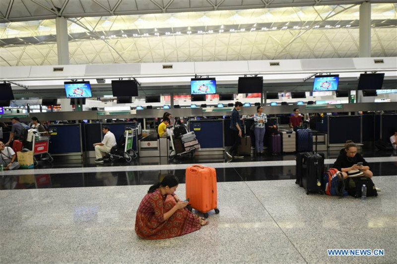 Chine : touristes bloqués suite au chaos à l'aéroport de Hong Kong