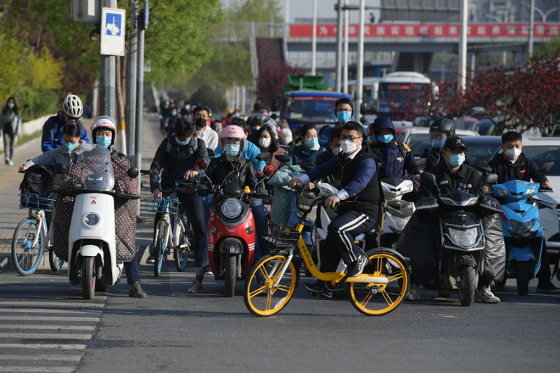 Les navetteurs de Beijing se mettent au vélo