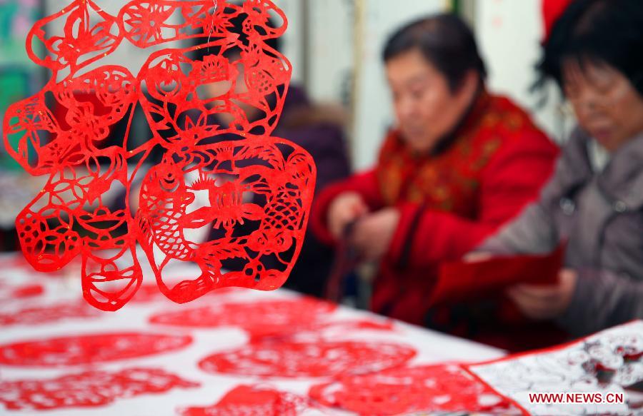 Du papier découpé pour accueillir la fête du Printemps à Beijing