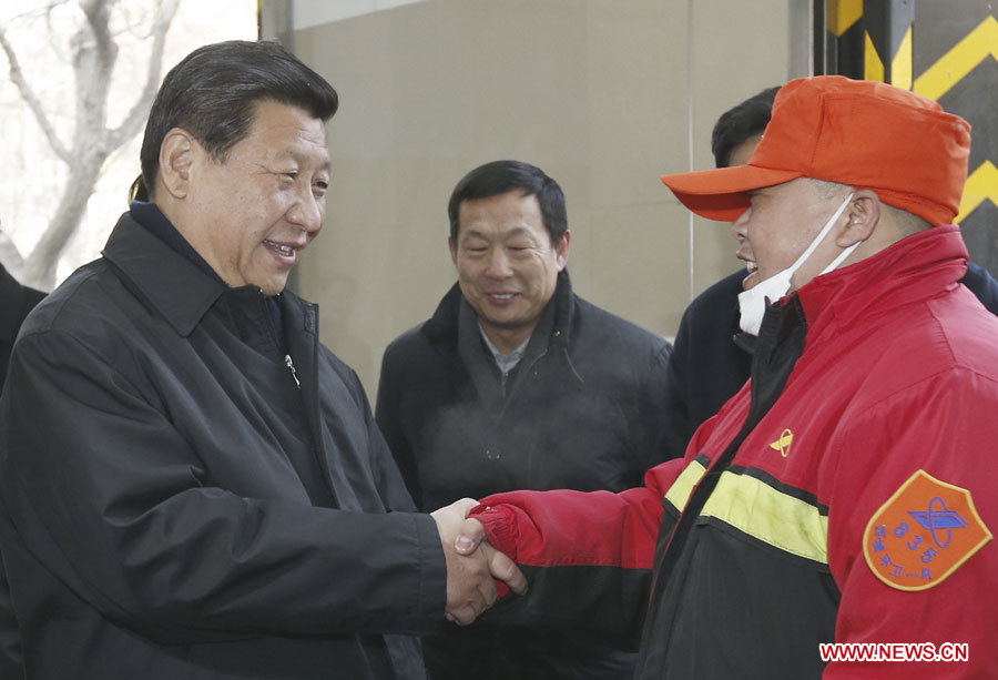 Xi Jinping exprime ses voeux du Nouvel An chinois aux ouvriers et policiers (5)